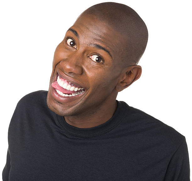istock Happy Young Man Makes Funny Face Sticking Out Tongue 175251719