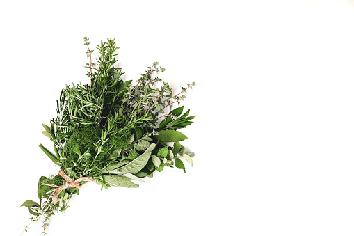 bunch of herbs isolated on white background.