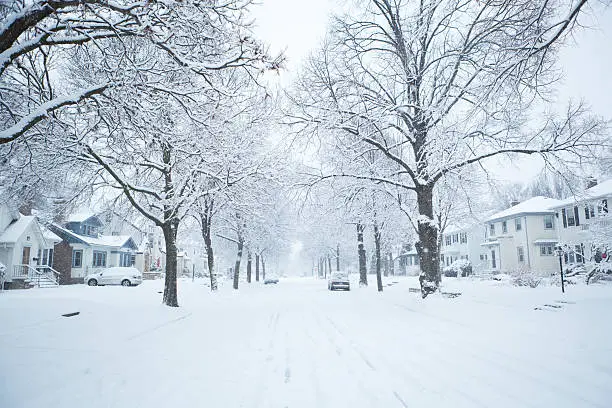 Photo of Winter Snow Storm Scene in Residential District of Midwest USA