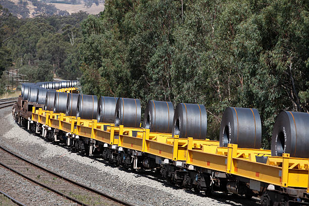 istock Trainload of coiled steel in hills 175252560