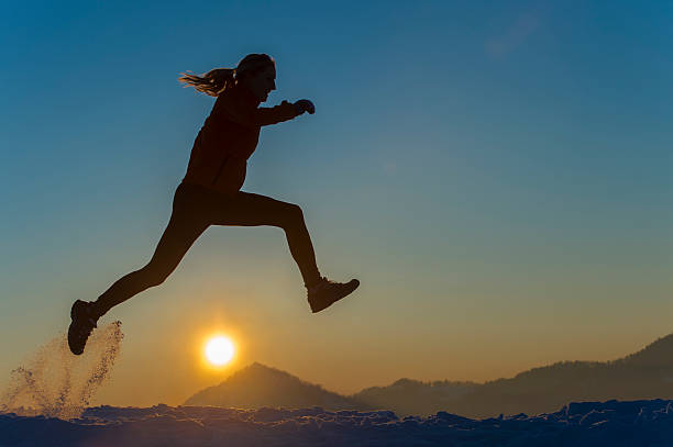 istock Young women at snow running 175252601