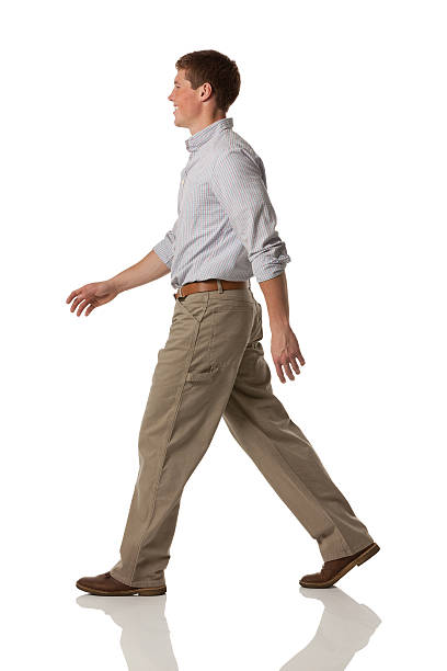 istock Side view of a young man walking 175252659