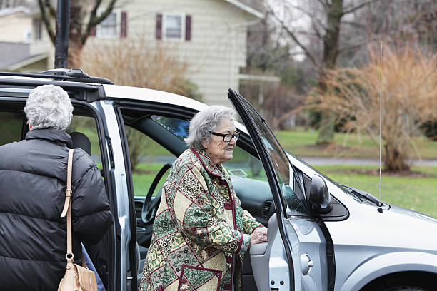 istock Senior Woman Getting Into Car 175252840