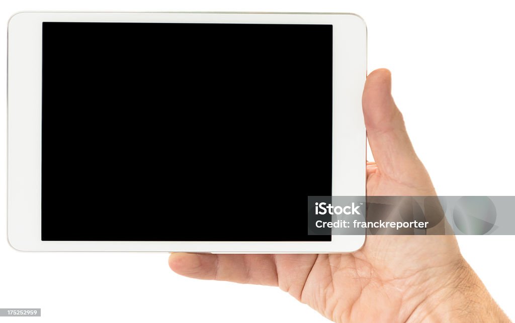 Mano umana che tiene una piccola digital tablet con schermo nero - Foto stock royalty-free di Attrezzatura