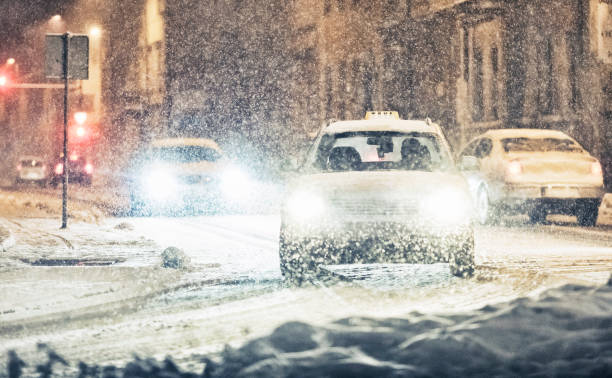 istock Late night traffic on a severe snow storm 175253600
