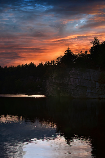 Evening Sky reflecting on Mohonk Lake, at Mohonk Mountain House Resort in Upstate New York.