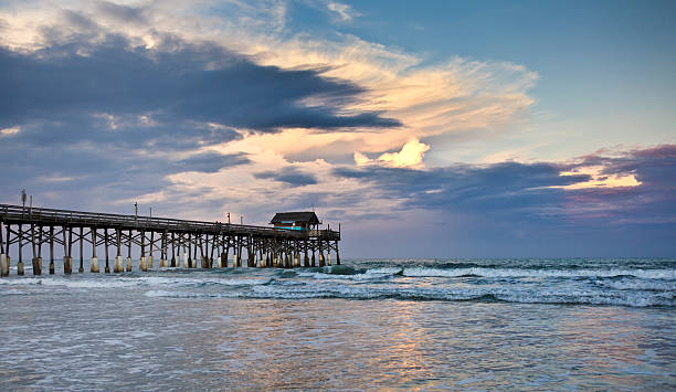 Cocoa Beach, Cape canaveral, Florida "Cocoa Beach, Florida at sunset" cocoa beach stock pictures, royalty-free photos & images