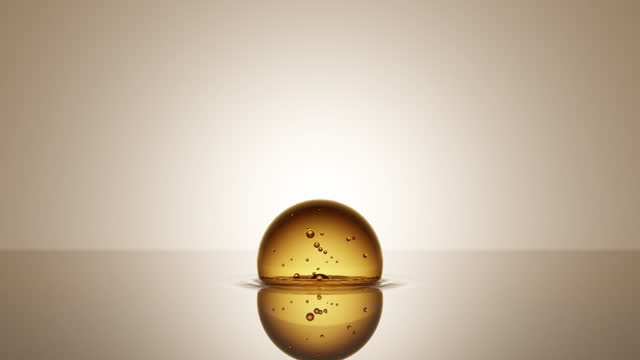 Gold 3D Collagen skin serum and vitamin drop liquid water.