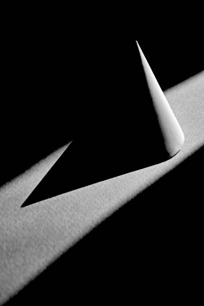 istock black and white conical shape and its shadow on dark background 1752541167