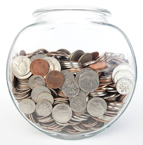 istock Fish Bowl of US Coins 175254124