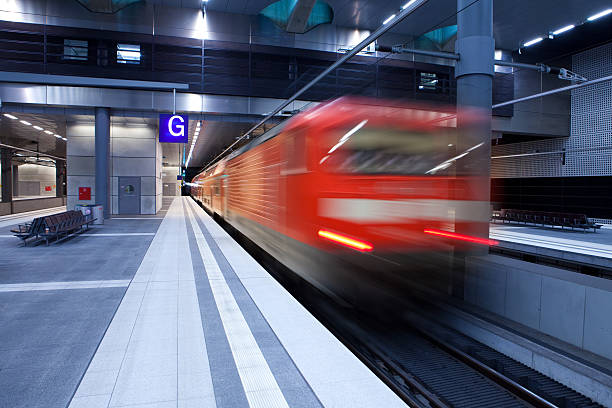 istock Blurred high speed commuter train at railway station platform 175254139