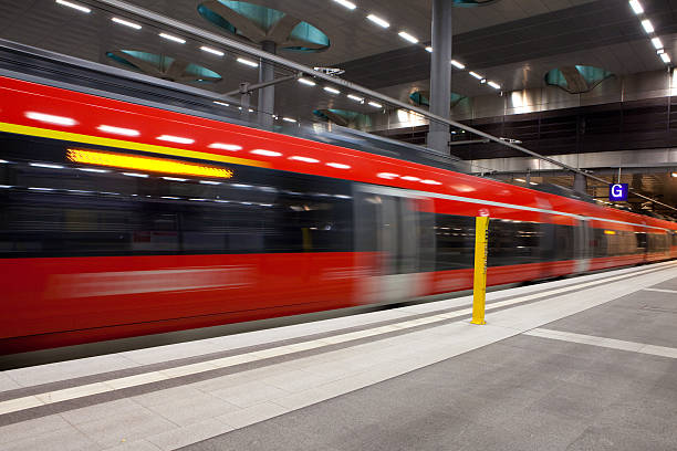 istock High speed commuter train passing by at railwaty station platform 175254379