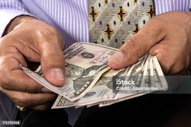 Counting The Cash Stock Photo - Download Image Now - Adult, Adults Only, American Fifty Dollar Bill