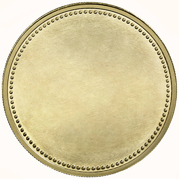 Black gold coin with dotted edge stock photo