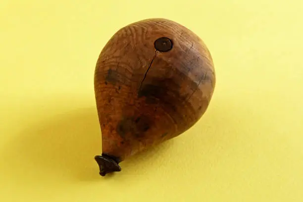 handmade old wooden spinning top
