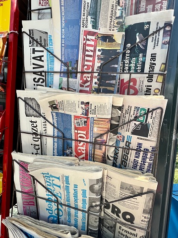 Baku, Azerbaijan  - May 28, 2023: Newspapers displayed on Baku street