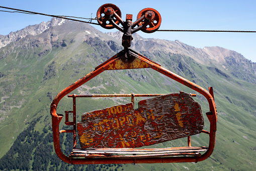 old chairlift in the mountains on a sunny day