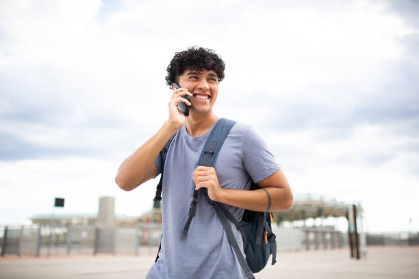 istock happy young man talking with mobile phone 1752554113