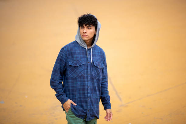 istock cool handsome young man with hoodie 1752555247