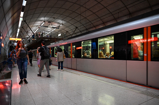 Bilbao, Spain, October 17, 2023 - The platform of Inbautxixu metro station with a train of the series CAF Bombardier UT500 of Bilbao metro.