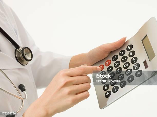 Value Of The Medical Care Stock Photo - Download Image Now - Calculator, Medical Student, Adult
