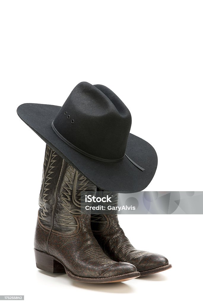 Occidentale/abito da cowboy boots e feltro nero Cappello isolato su bianco - Foto stock royalty-free di Stivali da cowboy