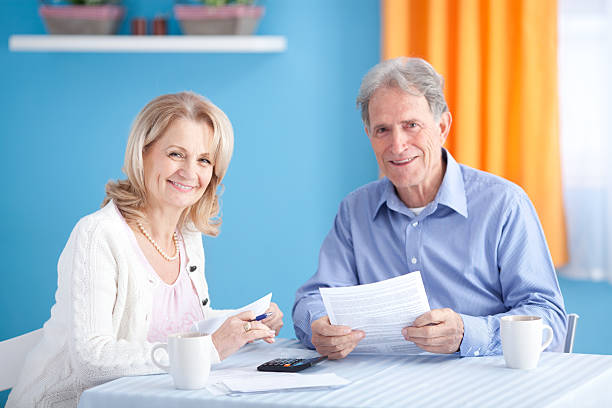 istock Senior couple with bills. 175256161