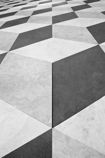 istock Modern paving made with stone blocks diamond-shaped white, black and gray in colour in a pedestrian zone 1752562214