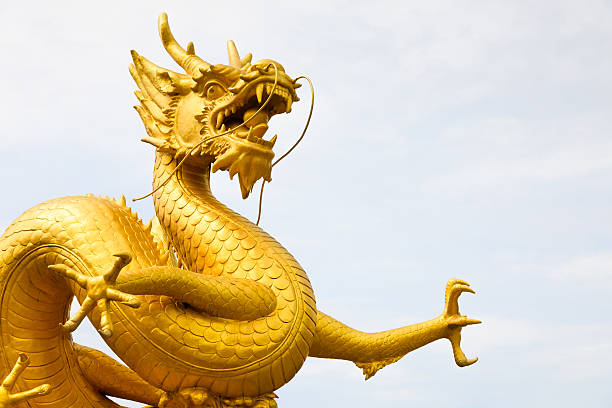 istock Golden dragon statue in temple 175256912