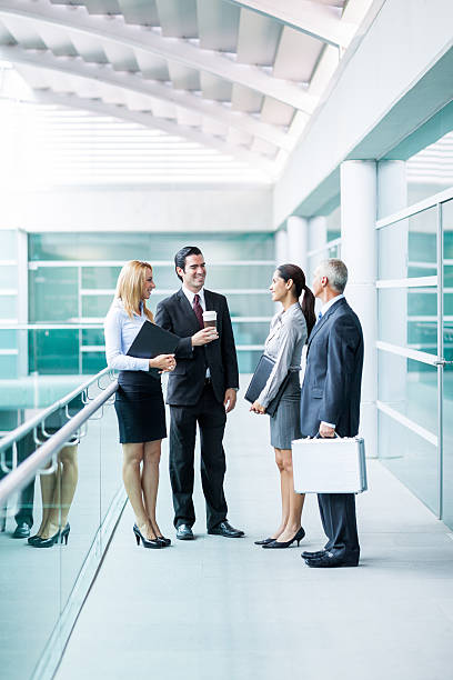 istock Business people talking in the office hallway 175257467