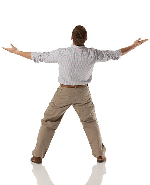 istock Rear view of a man with arms outstretched 175257597