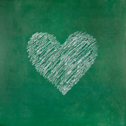 Heart shape drawn on blackboard