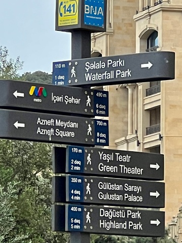 Baku, Azerbaijan  - May 29, 2023: Signs for tourists with landmarks directions in city center