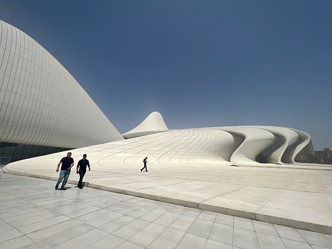 Baku, Azerbaijan  - May 30, 2023: The Heydar Aliyev Center is a 57,500 m² building complex designed by architect Zaha Hadid. Exhibition center and Museum named after Heydar Aliyev the first secretary of Soviet Azerbaijan and president of Azerbaijan Republic.