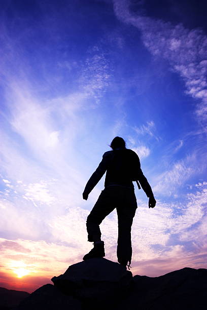 istock woman rock climbing silhouette 175258415