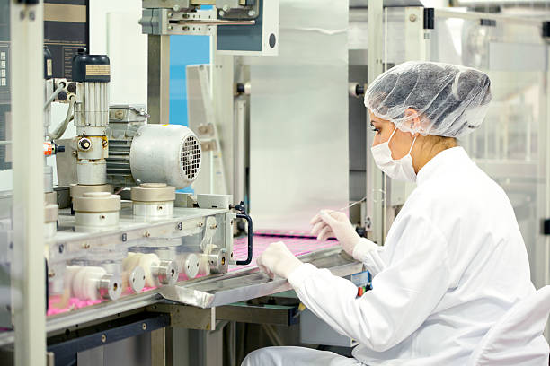 istock Woman working at the pharmaceutical factory 175259497