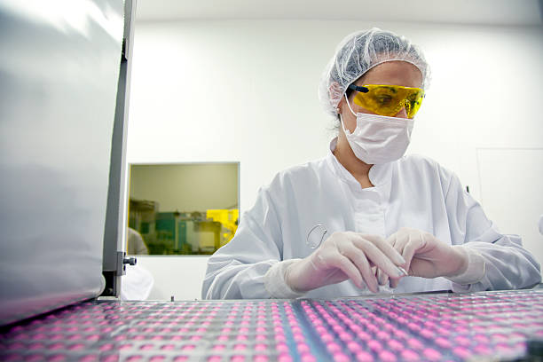 Female scientist working in a factory stock photo