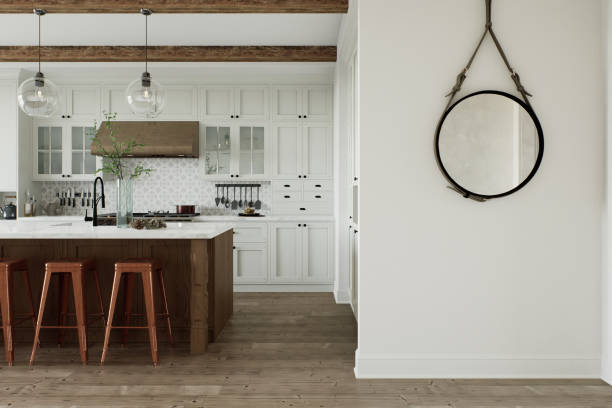 istock Traditional large L-shaped kitchen with large island and kitchen appliances. Kitchen interior with white cabinets and wooden island. 3D rendering 1752599961