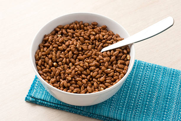 Cocoa cereal A bowl of cocoa cereal. rice cereal plant stock pictures, royalty-free photos & images