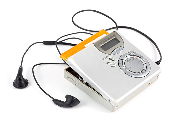 istock Old MiniDisc player with headphones on a white background 175260389