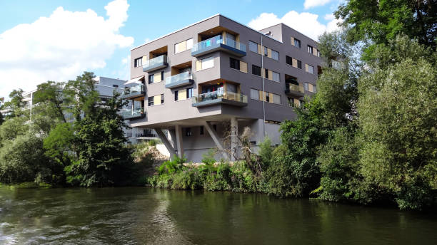 istock Modern residential building jutting out into a river 1752607482