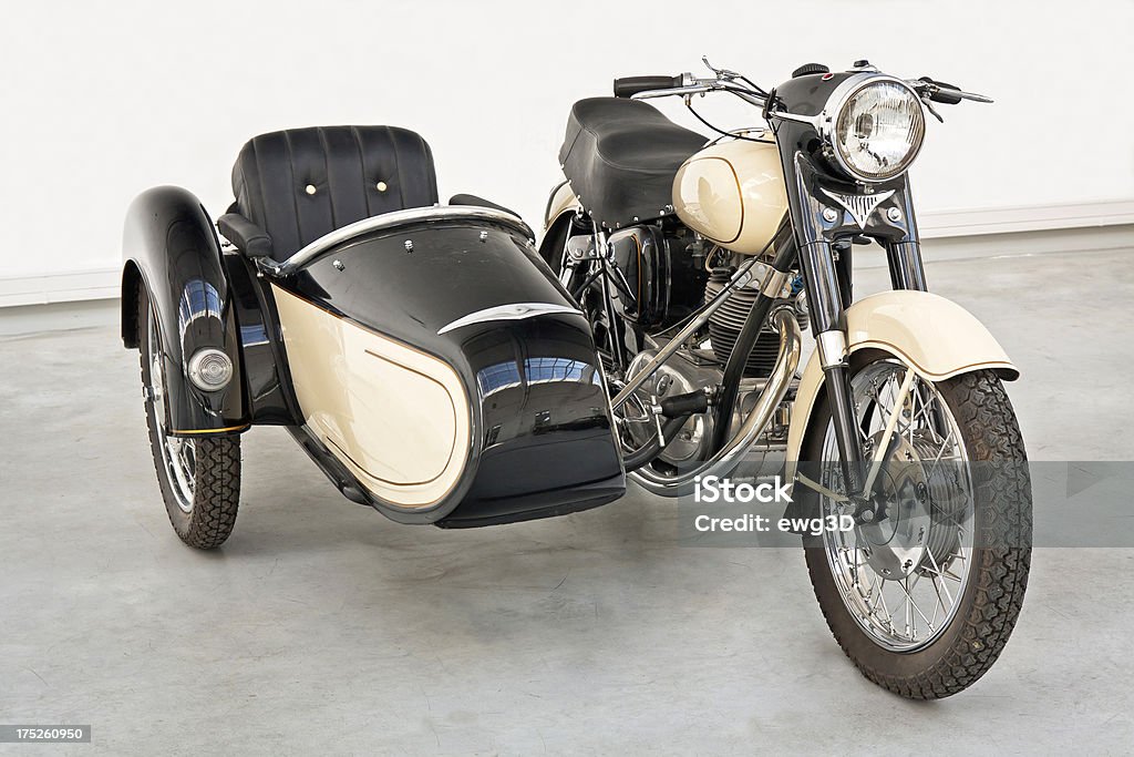 Motorcycle with sidecar "Old-fashioned motorcycle with sidecar - Junak M10 made in 1963, PolandSee more MOTORCYCLES images here:" Motorcycle Stock Photo