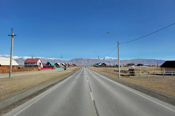 Photo of Altai mountain village along the highway. Kosh-Agach, Altai Republic.