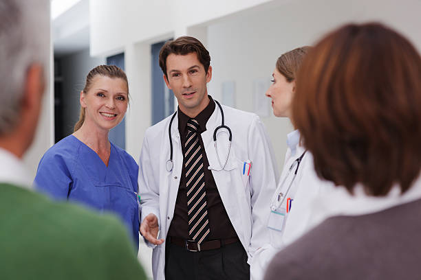 istock Medical team greeting patient 175261073