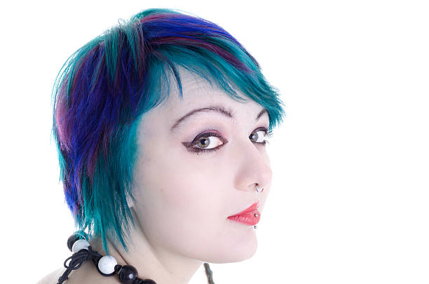 istock Blue and green haired woman with quizical expression. 175261199