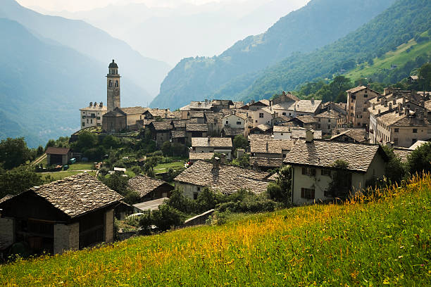 гора vilage - engadine switzerland village church стоковые фото и изображения