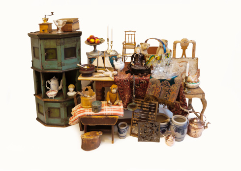 Stand with antique  furniture, art objects, toys,  carpets, china, glass etc.