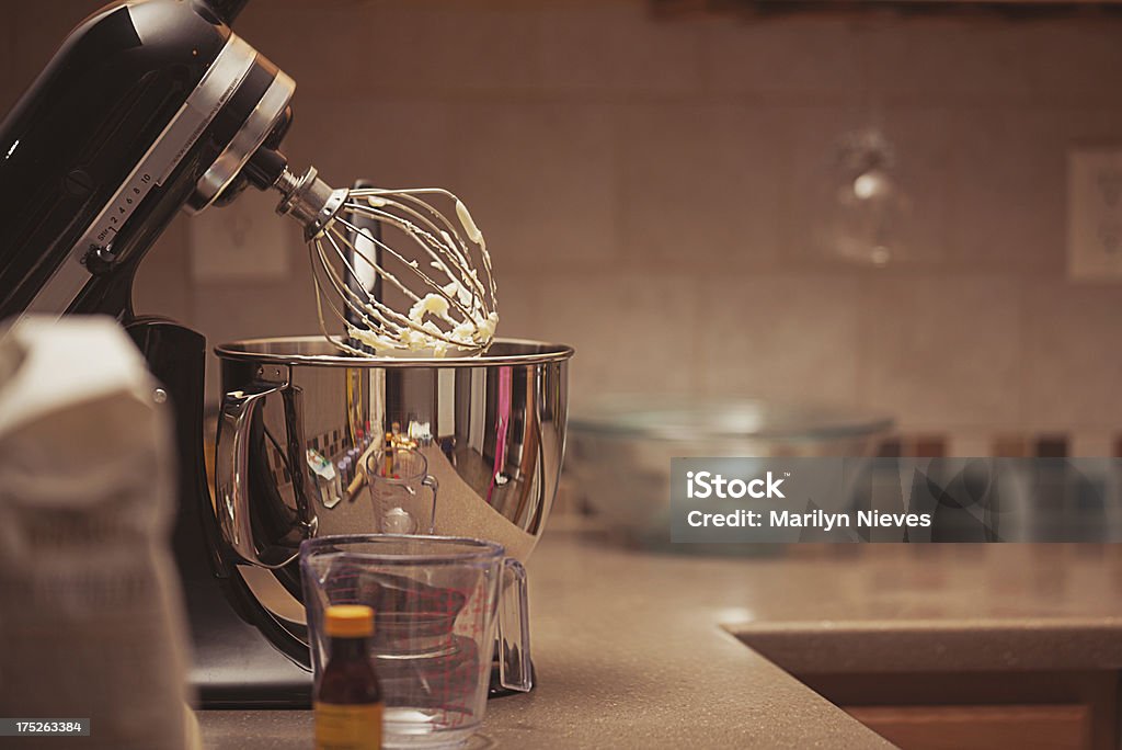 cooking baking ingredients Mixer surrounded with cooking baking ingredients. Electric Mixer Stock Photo