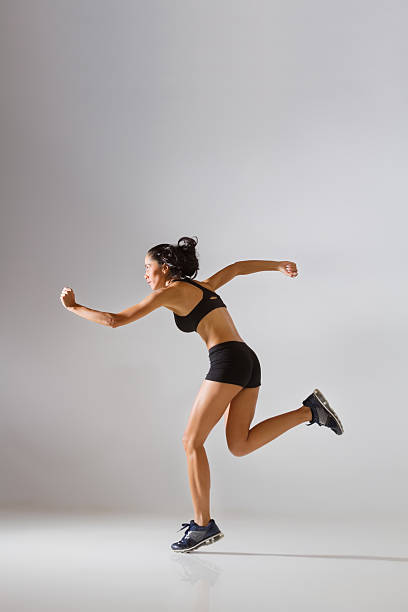 istock Side View Of Young Woman Running 175263891