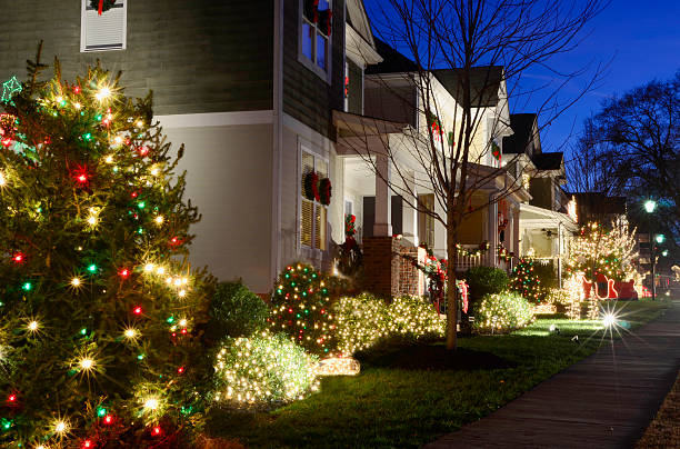 istock Christmas lights in front of Victorian-style homes 175264519